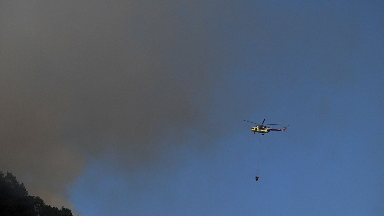 Düzce Yığılca'da orman yangınına yoğun müdahale: Helikopter takviyesiyle çalışmalar sürüyor