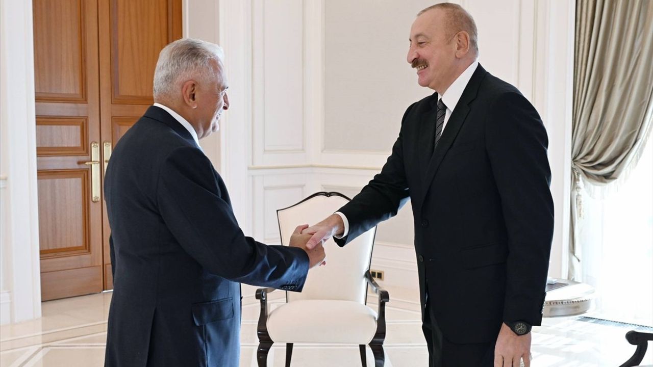 Aliyev, Gebele'de TDT Aksakallar Konseyi Başkanı Binali Yıldırım'ı kabul etti
