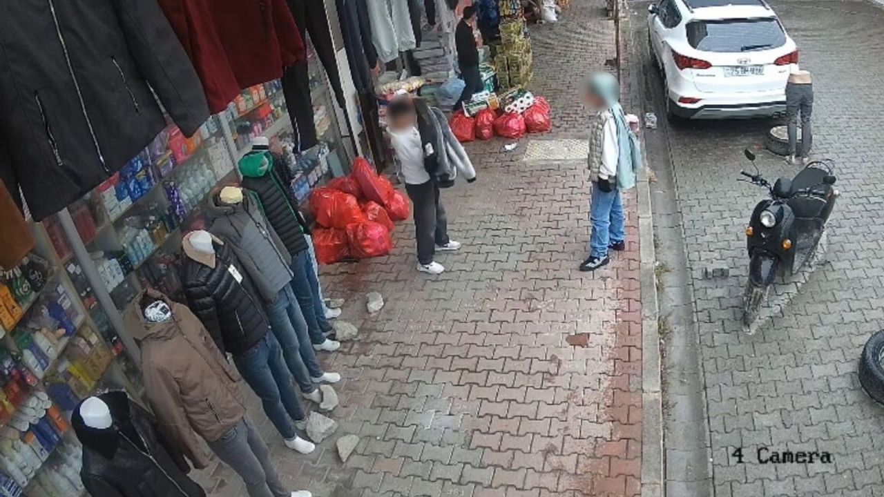 Iğdır'da Adil Aşırım Çarşısı'nda iki çocuğun mağaza hırsızlığı güvenlik kamerasına yansıdı