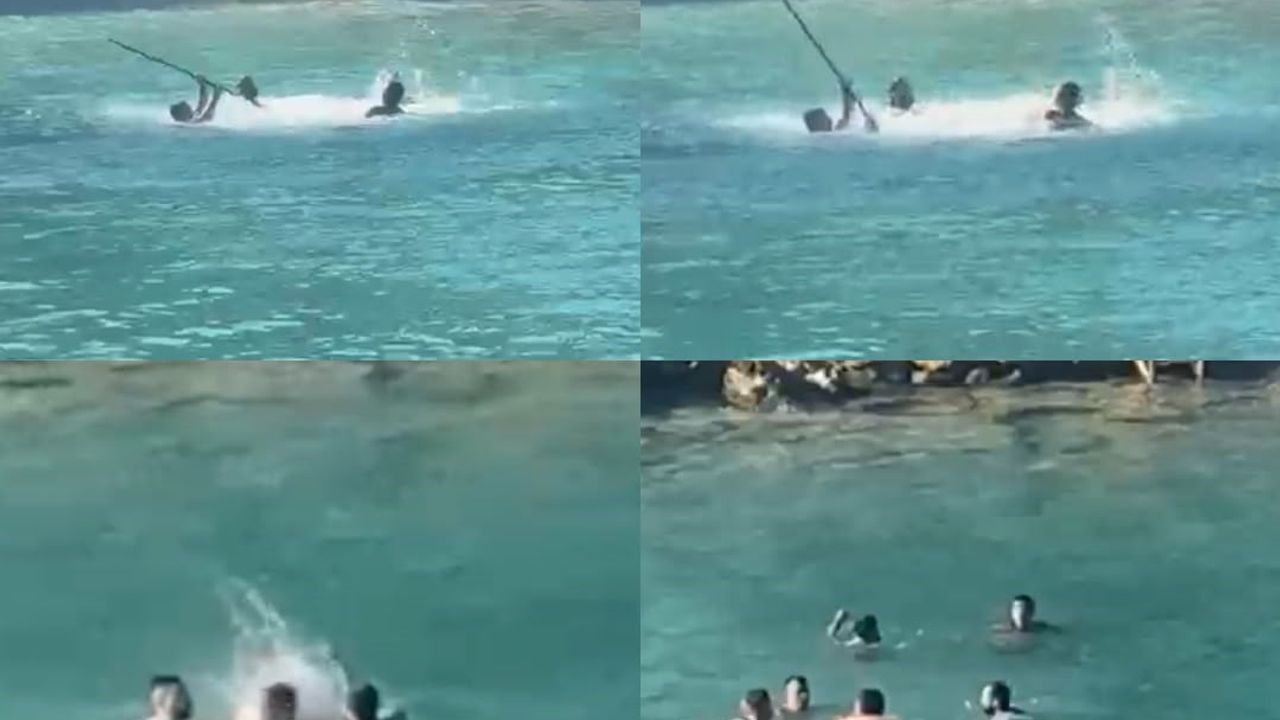 Mersin'de denizin ortasında sopalı kavga kamerada