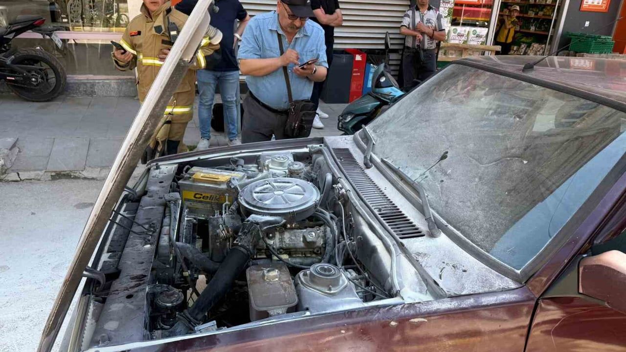 Yalvaç’ta motor bölümünde çıkan yangın, sürücü ve market çalışanının müdahalesiyle söndürüldü