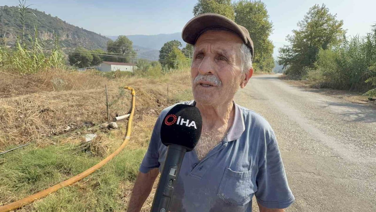 Alevlerin ortasında su taşıyan 76 yaşındaki Nazmi Kundakçı
