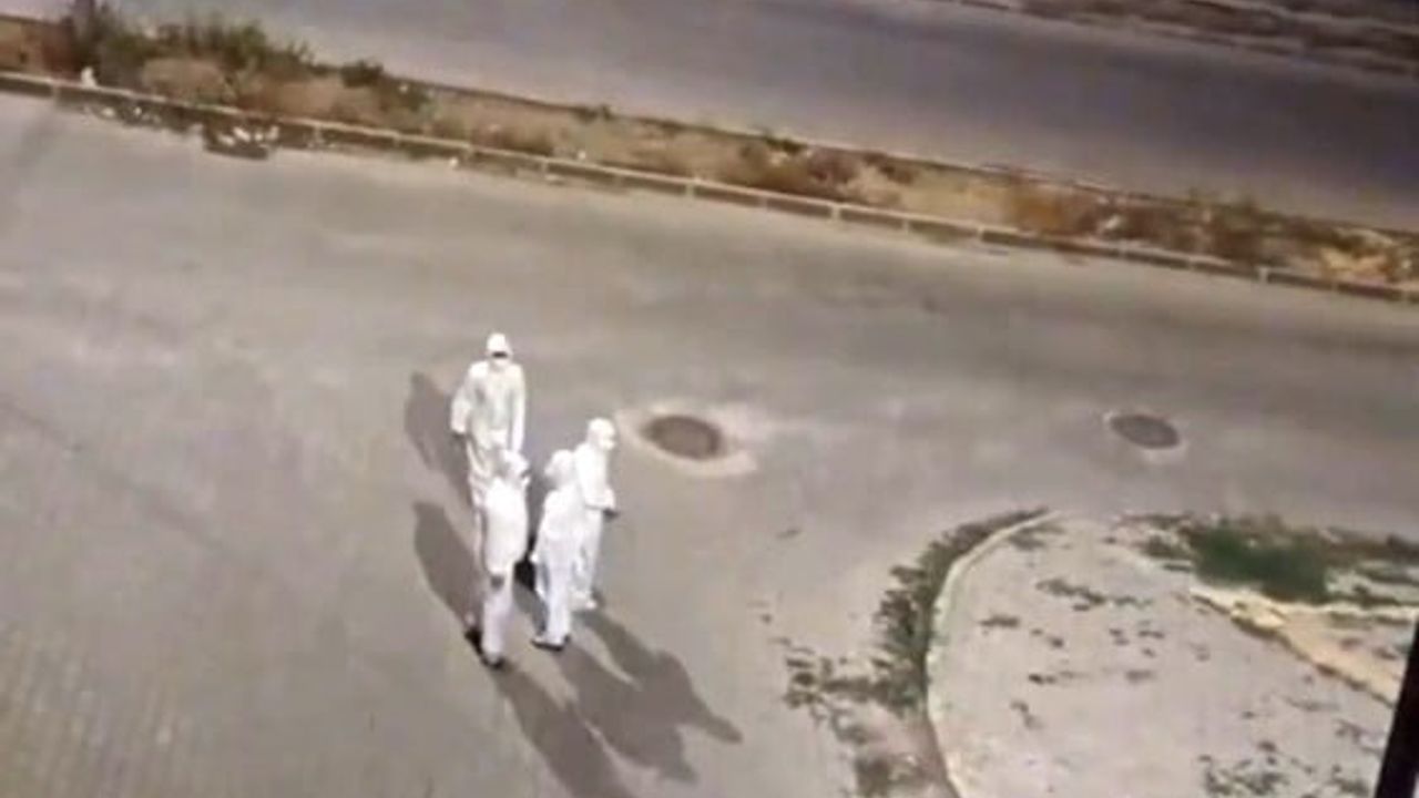 Elbistan'da gece beyaz koruyucu tulumlu grubun dolaşması soru işareti bıraktı