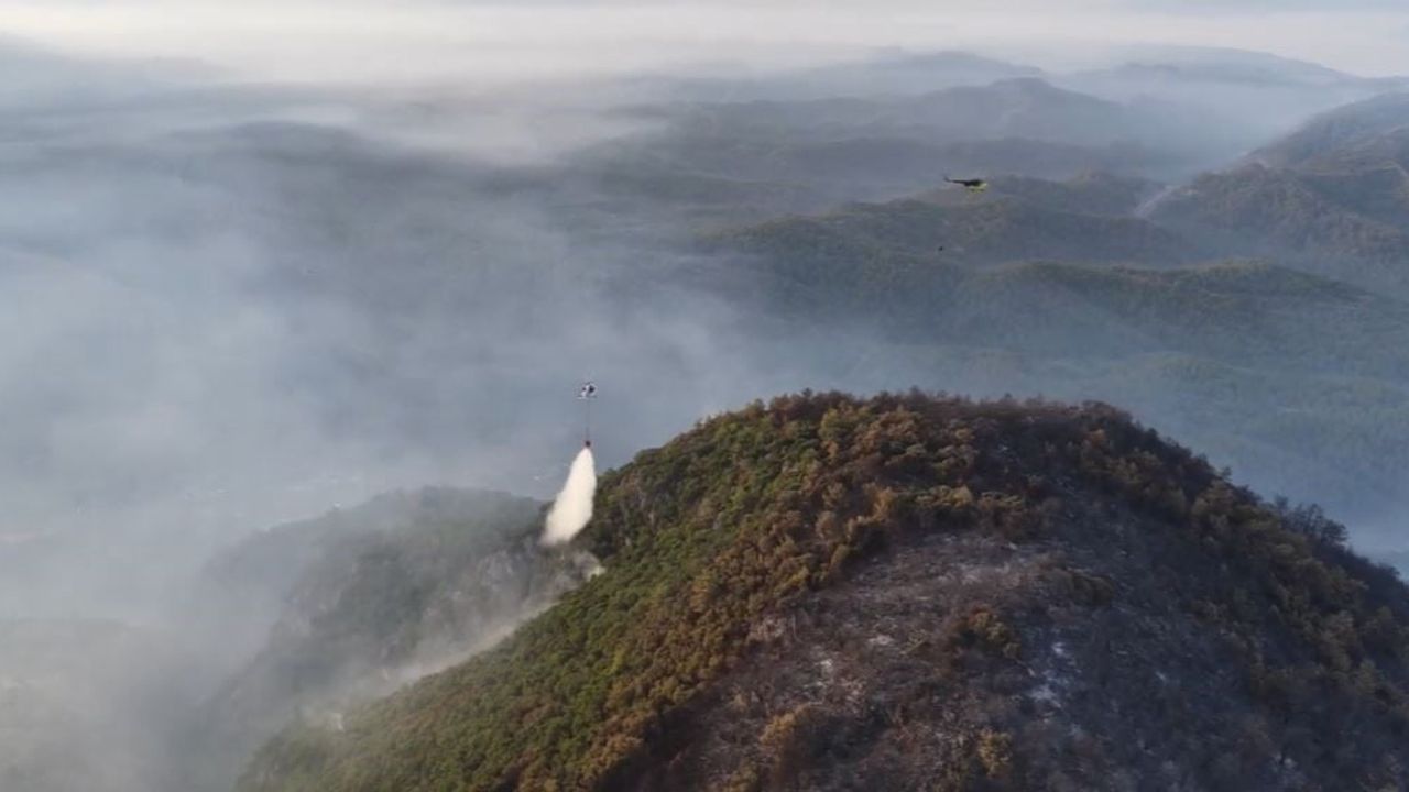 Fethiye Göcek'te 24 saati aşan orman yangınına hava ve kara seferberliği