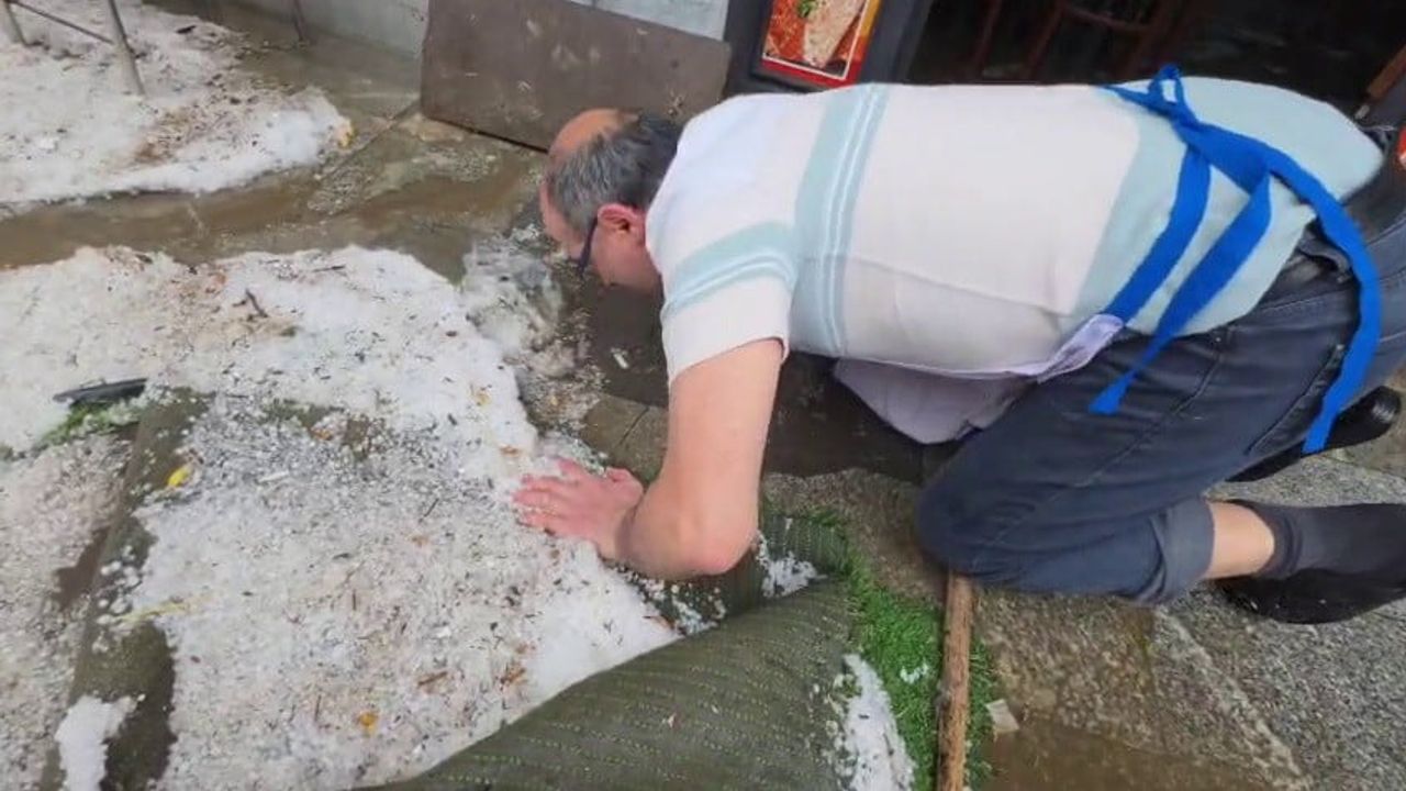 İspir'de sağanak ve fırtına etkisi: iş yerlerini su bastı
