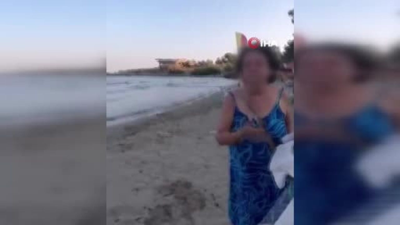 Seferihisar Ürkmez İpekkum plajında yaşlı kadının anne ve kıza sözlü saldırısı kamerada