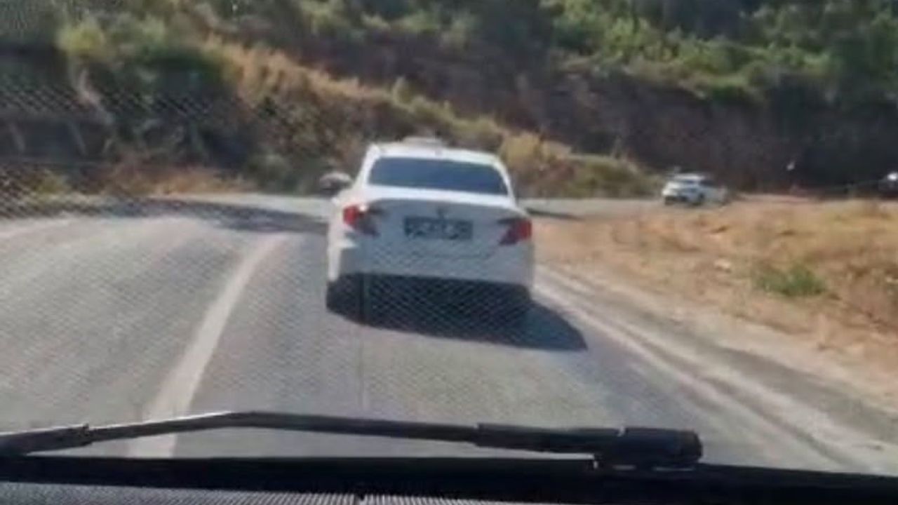 Sosyal medyadan tespit edildi: Marmaris'te ormana izmarit atan sürücüye işlem