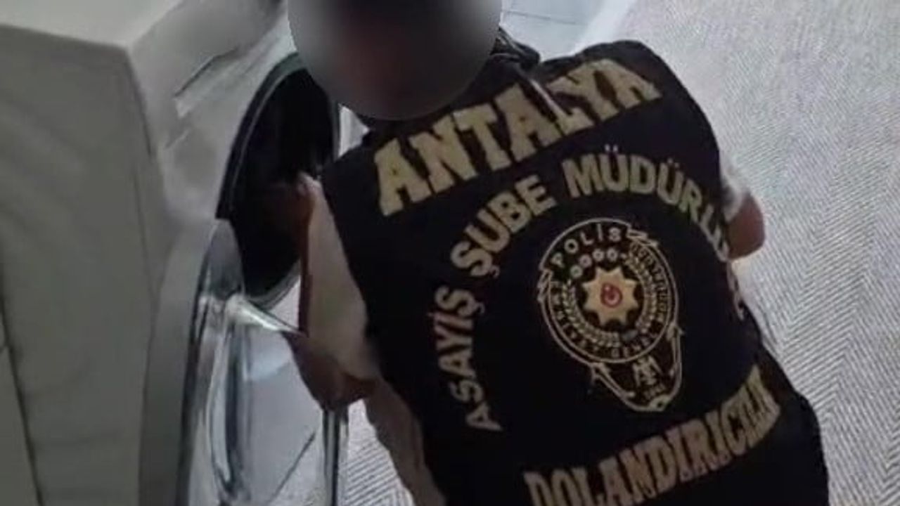 Antalya'da yetkili servis kisvesiyle para talep eden iki şüpheli yakalandı