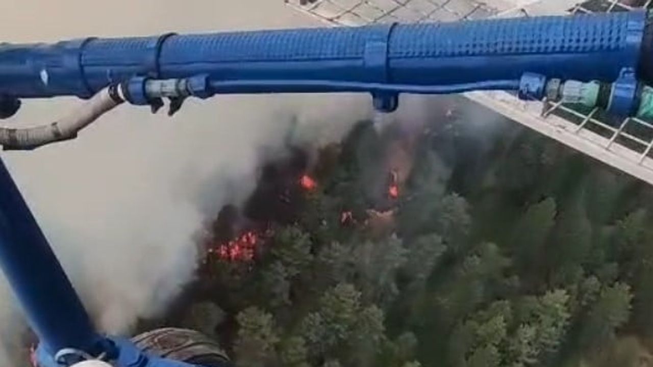 Kuyucak'taki yangınla mücadele dağlık arazide hava ve kara ekiplerine kaldı
