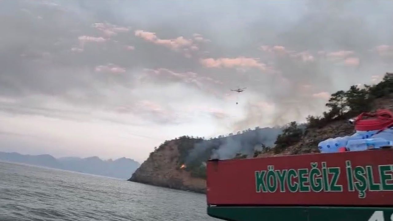 Marmaris'te alevlerin enerjisi düştü, soğutma çalışmaları sürüyor