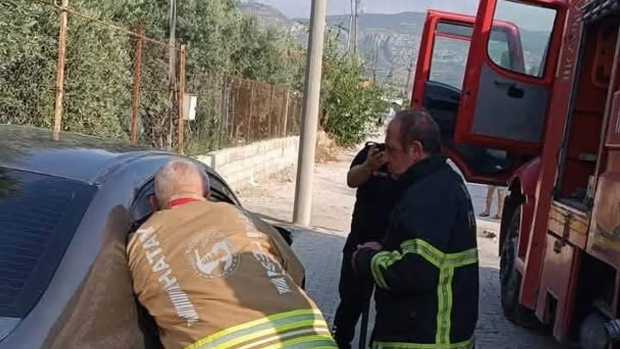 Samandağ'da araçta kilitli kalan çocuk itfaiye ekiplerince kurtarıldı