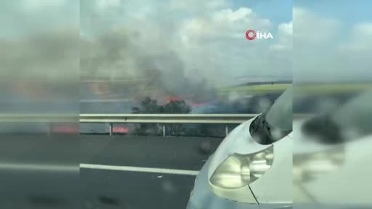 silivri'de tarlada başlayan yangın rüzgarla yayılarak TEM otoyolu trafiğini etkiledi