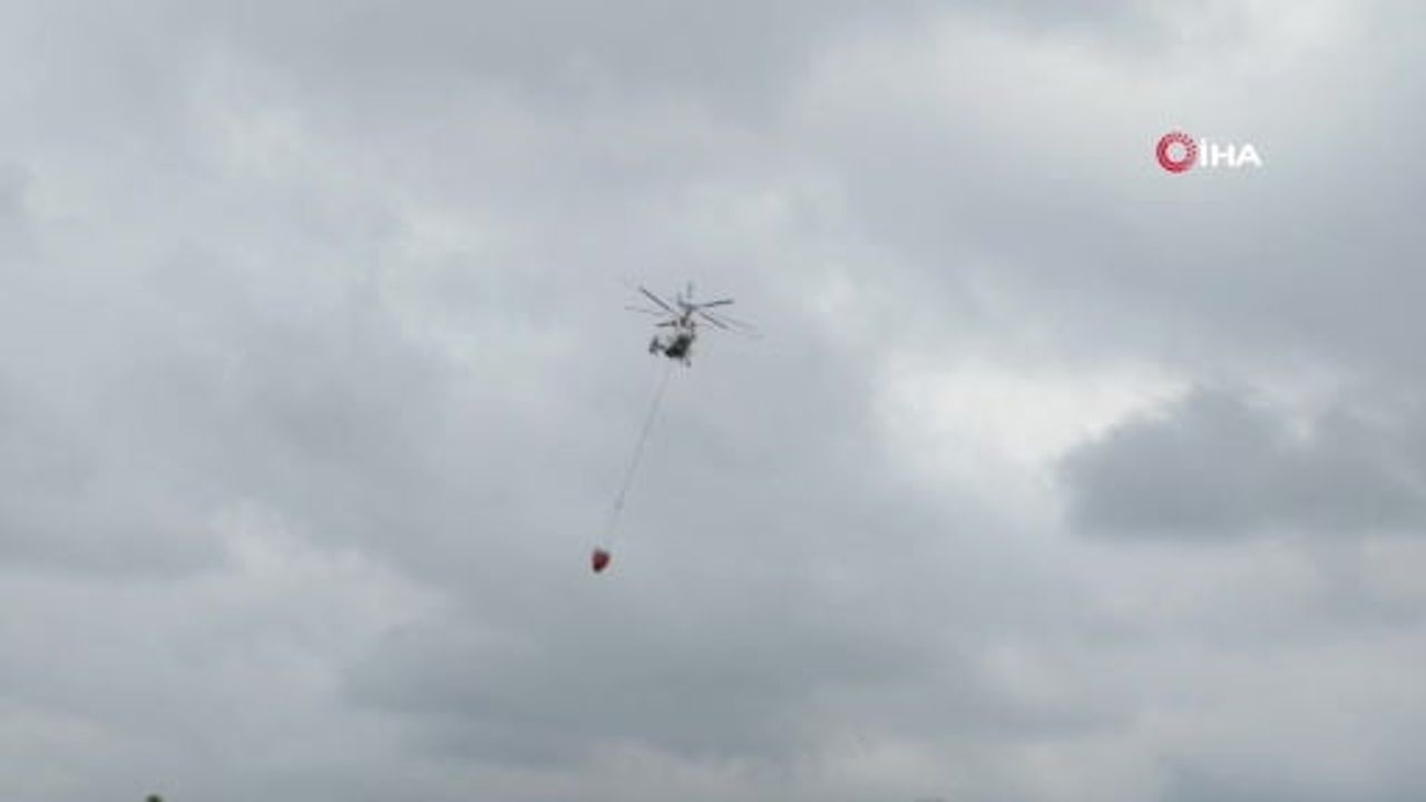 Arnavutköy'de rüzgârın tehdidine rağmen orman yangını helikopterlerle kontrol altına alındı