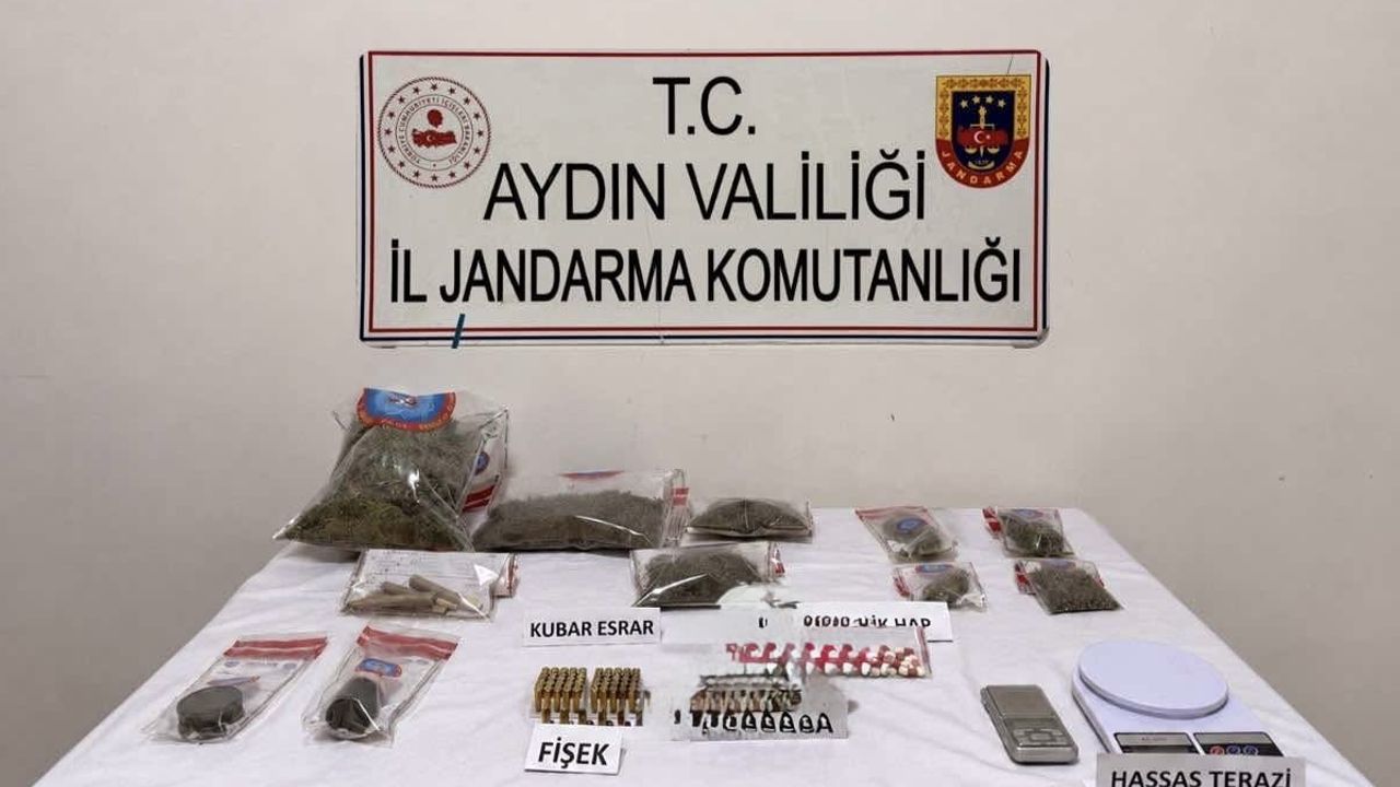 Söke’de eş zamanlı baskında büyük miktarda esrar ve silah ele geçirildi