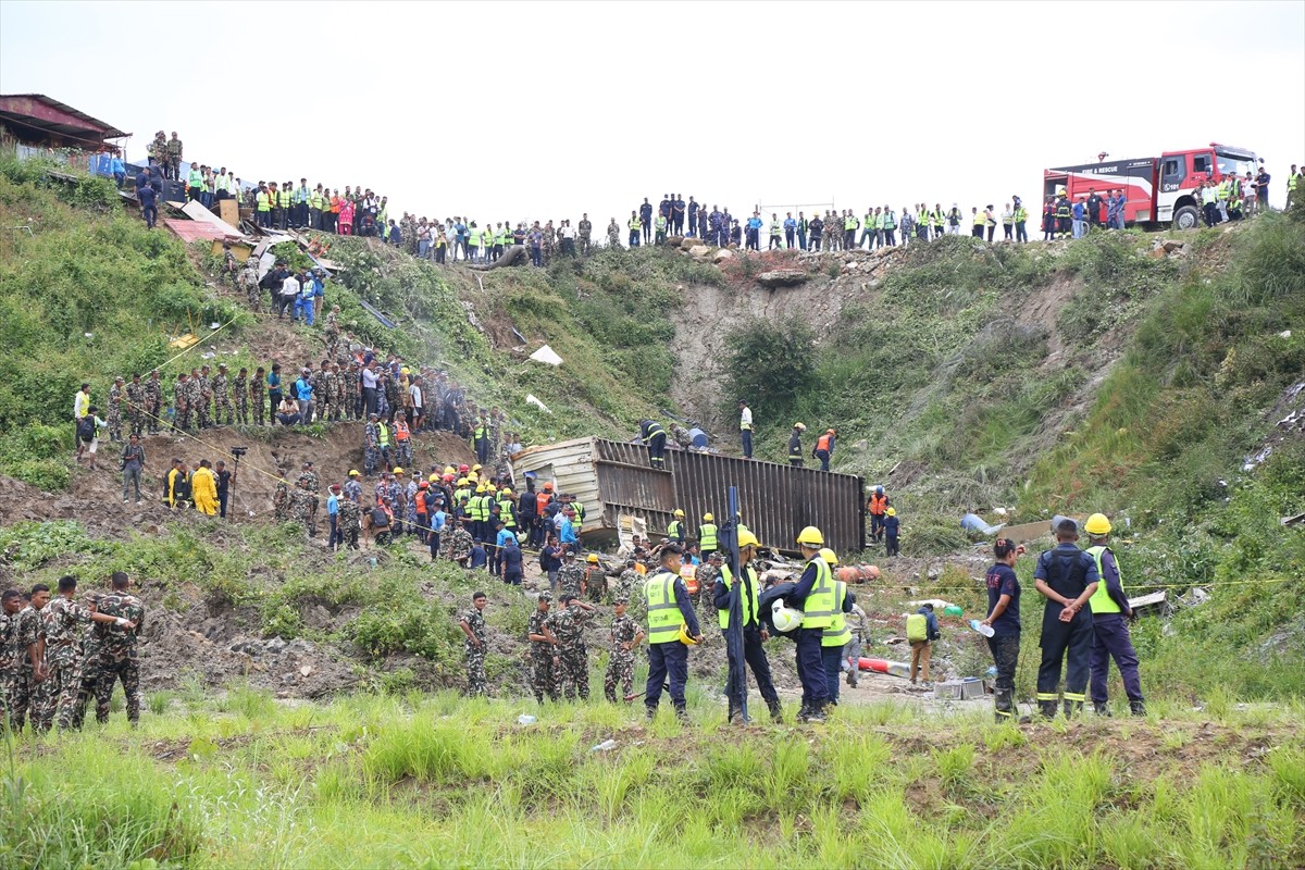 Nepal'in başkenti Katmandu'daki Tribhuvan Uluslararası Havalimanı'nda 19 kişiyi taşıyan bir uçak...