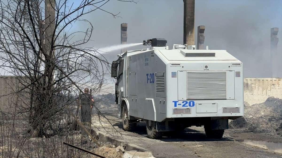 Adana'nın merkez Seyhan ilçesinde kontrol altına alınan geri dönüşüm fabrikasının bahçesindeki...