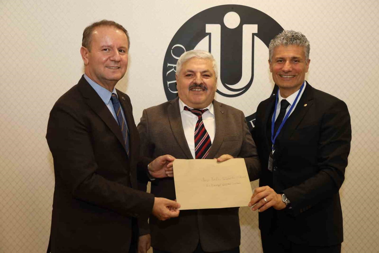 REKTÖR ORHAN BAŞ (SOLDA)