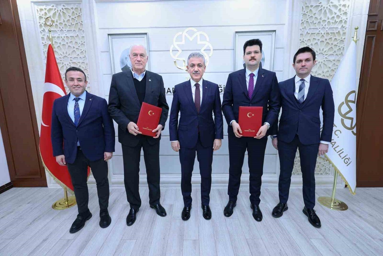 VALİLİKTE DÜZENLENEN PROTOKOL TÖRENİNE VALİ YARDIMCISI HASAN KURT, NUSAYBİN KAYMAKAMI EVREN ÇAKIR...