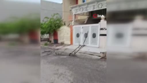 Irak Kürt Bölgesel Yönetimi'nin (IKBY) başkenti Erbil merkezde bir evin üzerine düşen dron maddi...