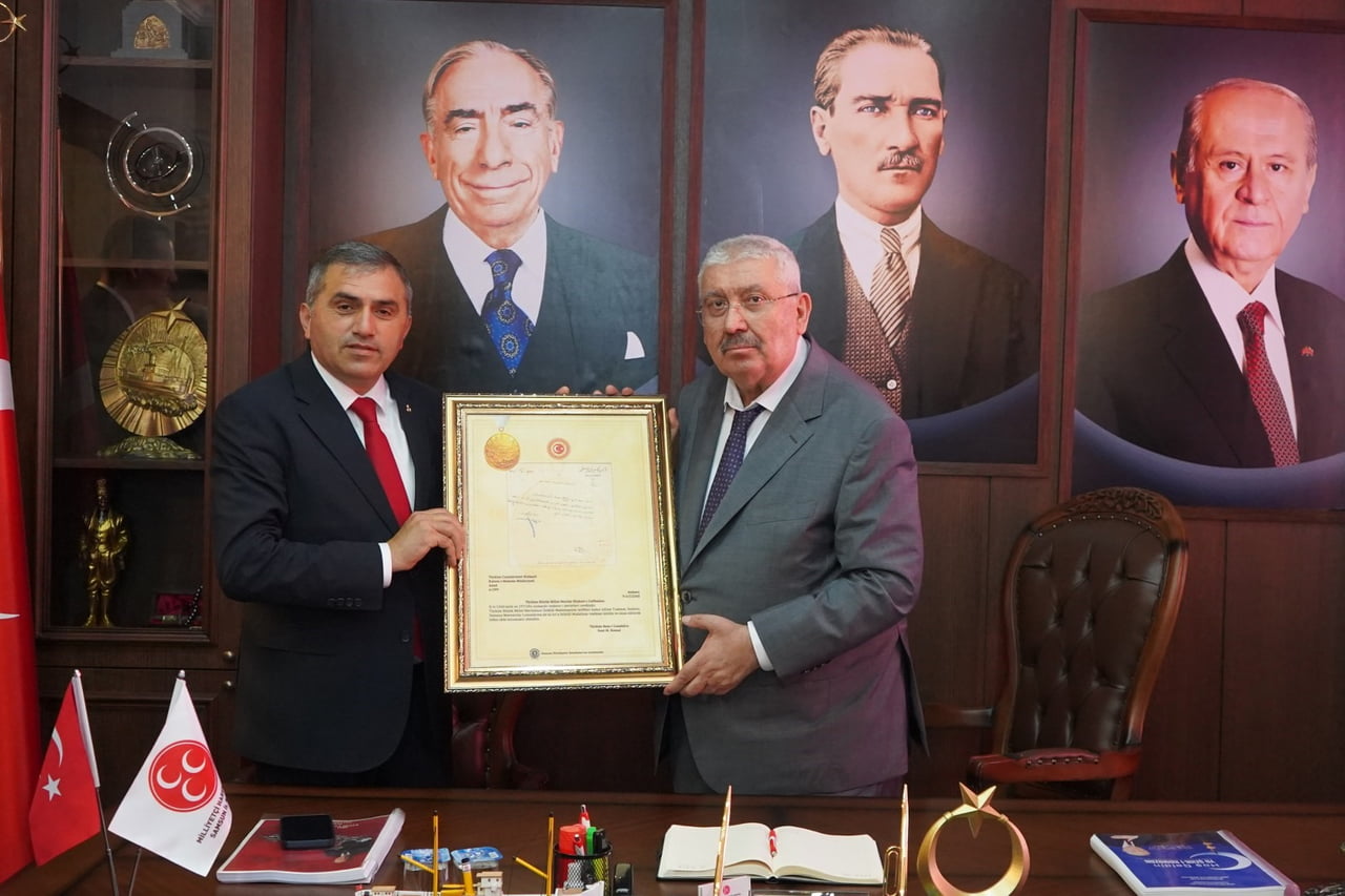 MHP SAMSUN İL BAŞKANI BURHAN MUCUR (SOLDA) VE  MHP TEŞKİLATLARDAN SORUMLU GENEL BAŞKAN YARDIMCISI...