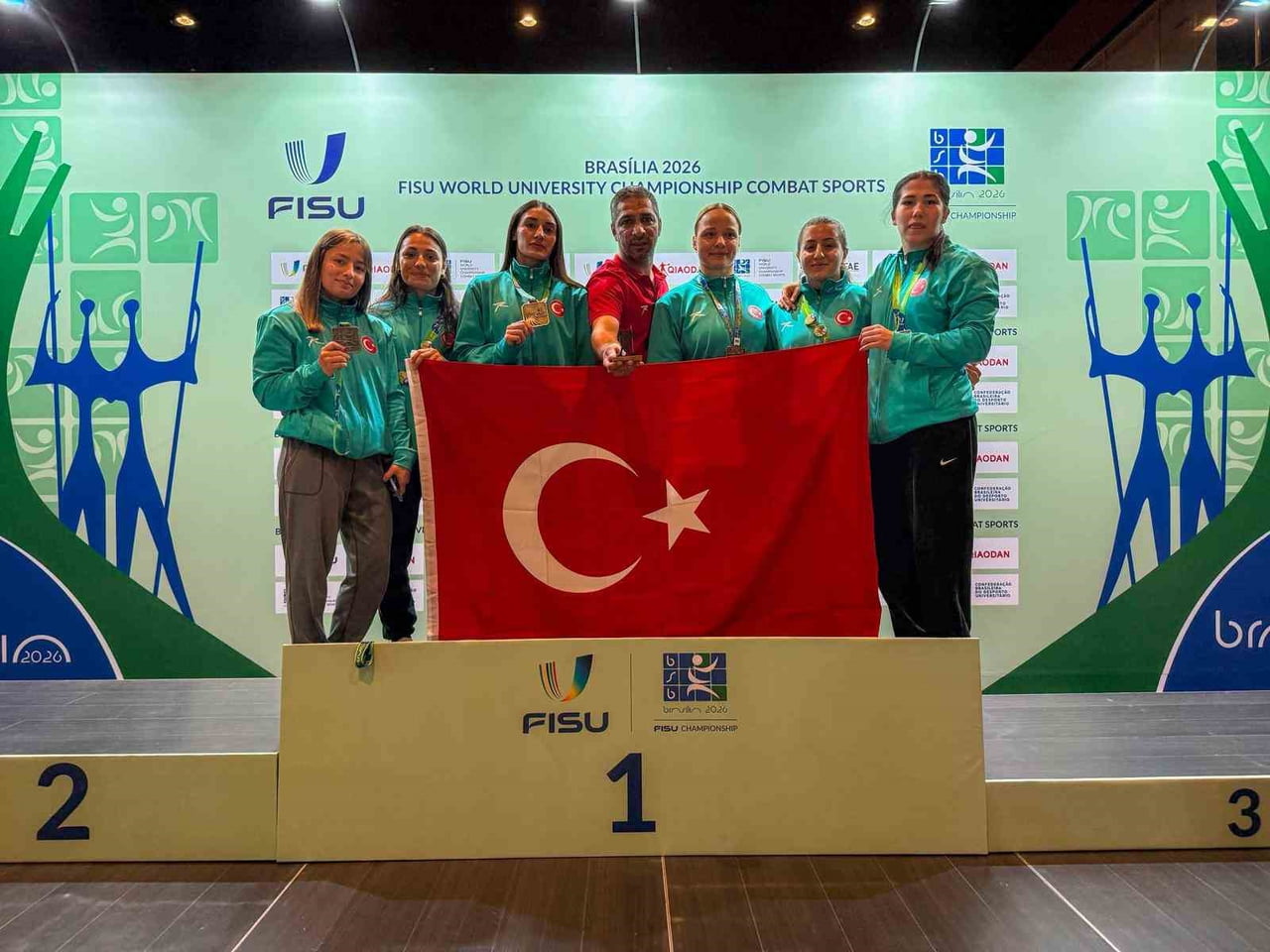 BREZİLYA'DA DÜZENLENEN FISU DÜNYA ÜNİVERSİTELER GÜREŞ ŞAMPİYONASI'NDA MÜCADELE EDEN KADIN GÜREŞ...