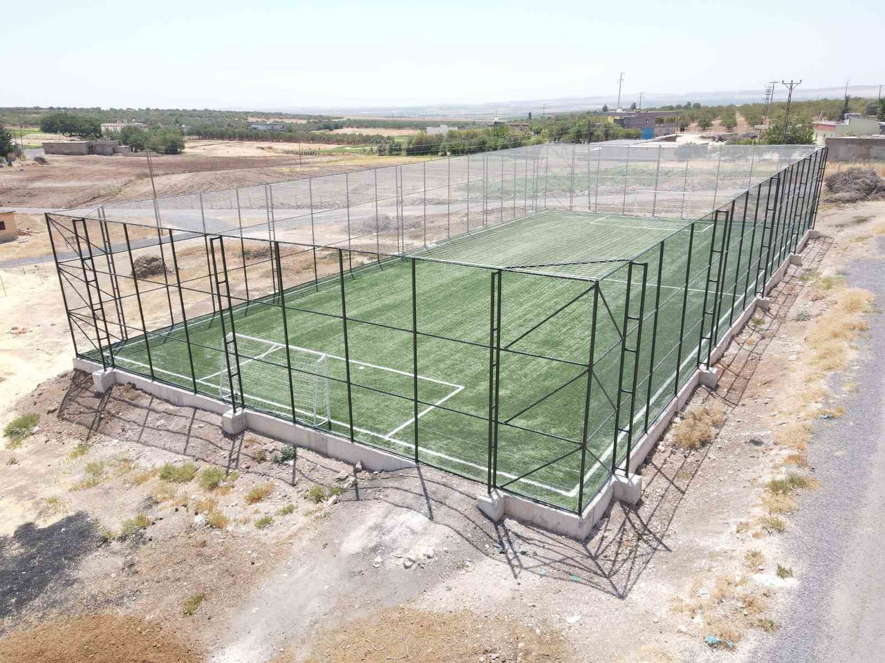 HALİLİYE’DE 15 KIRSAL MAHALLEYE DAHA SPOR YATIRIMI