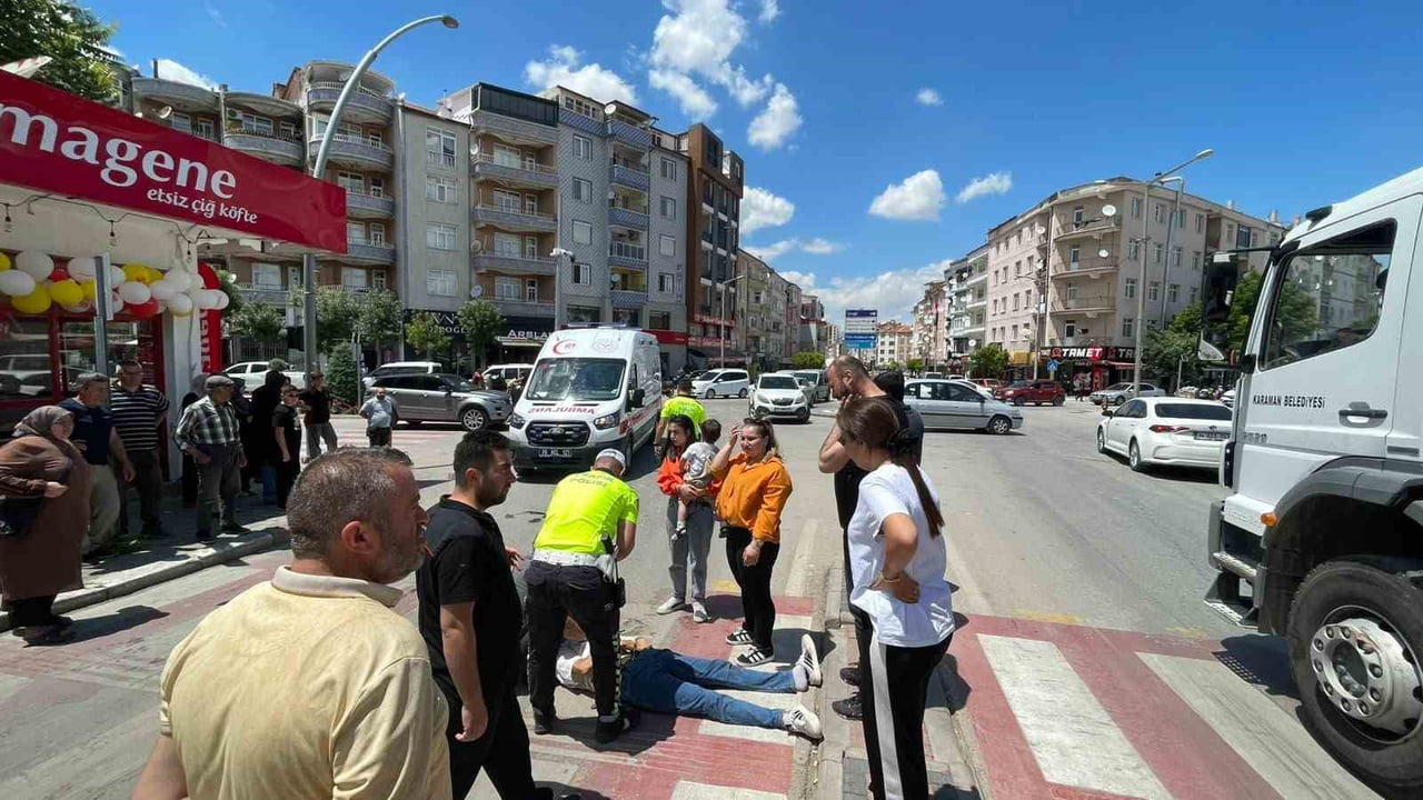 KARAMAN'DA OTOMOBİL İLE ÇARPIŞAN MOTOSİKLETİN SÜRÜCÜSÜ YARALANDI.