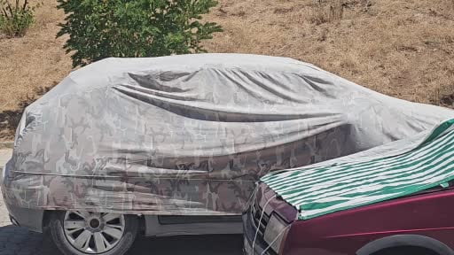 Elazığ'da araç sahiplerinden güneşe karşı önlem