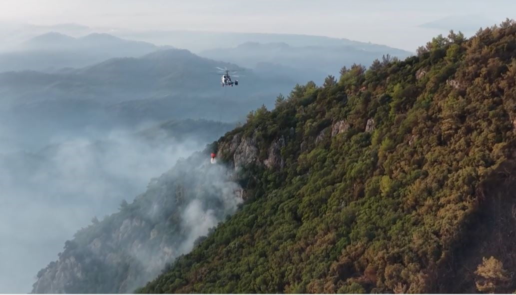 GÖCEK'TE DÜN ÖĞLEN ÇIKAN VE YAKLAŞIK 24 SAATTİR DEVAM EDEN ORMAN YANGININI SÖNDÜRMEK İÇİN...