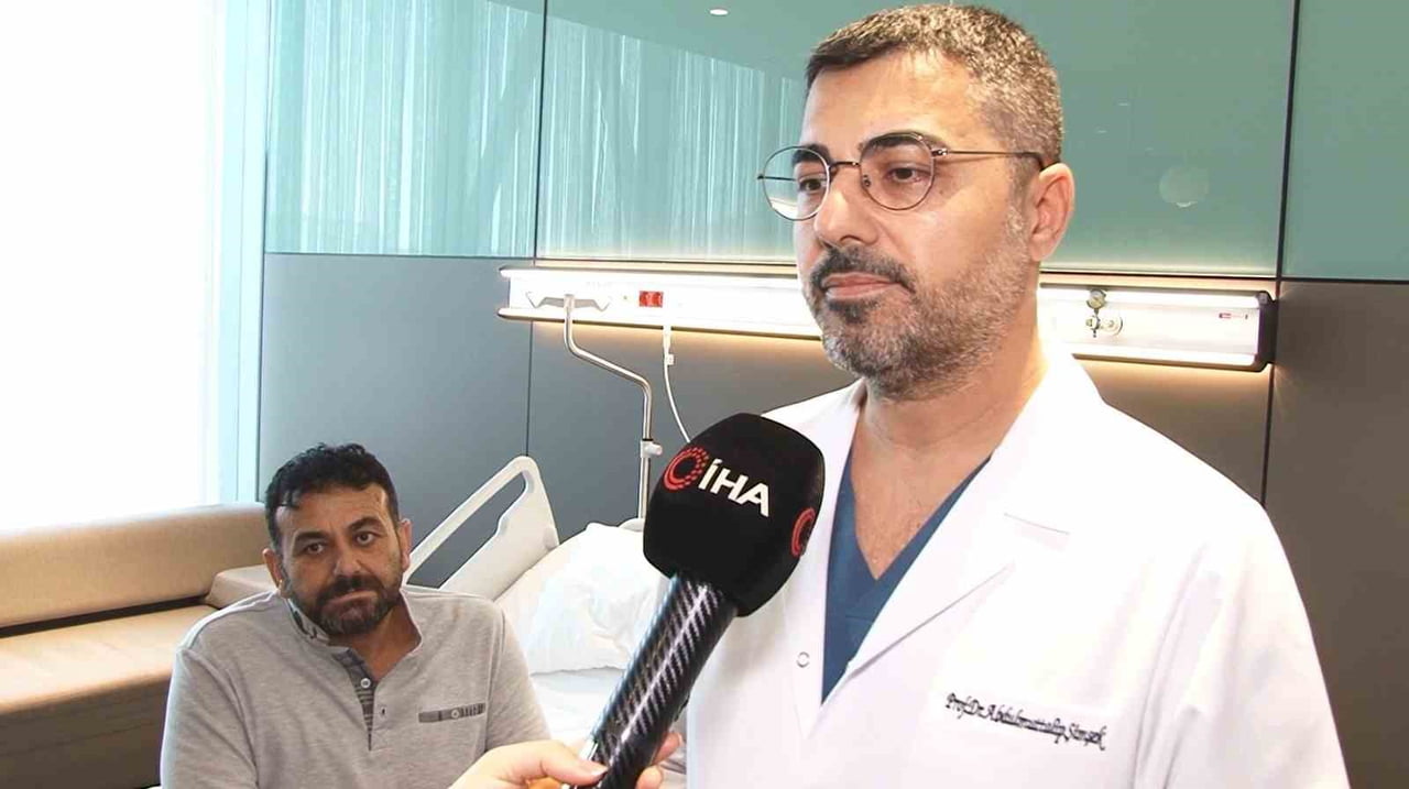 ORHAN POLAT (SOLDA) VE PROF. DR. ABDULMUTTALİP ŞİMŞEK (SAĞDA)