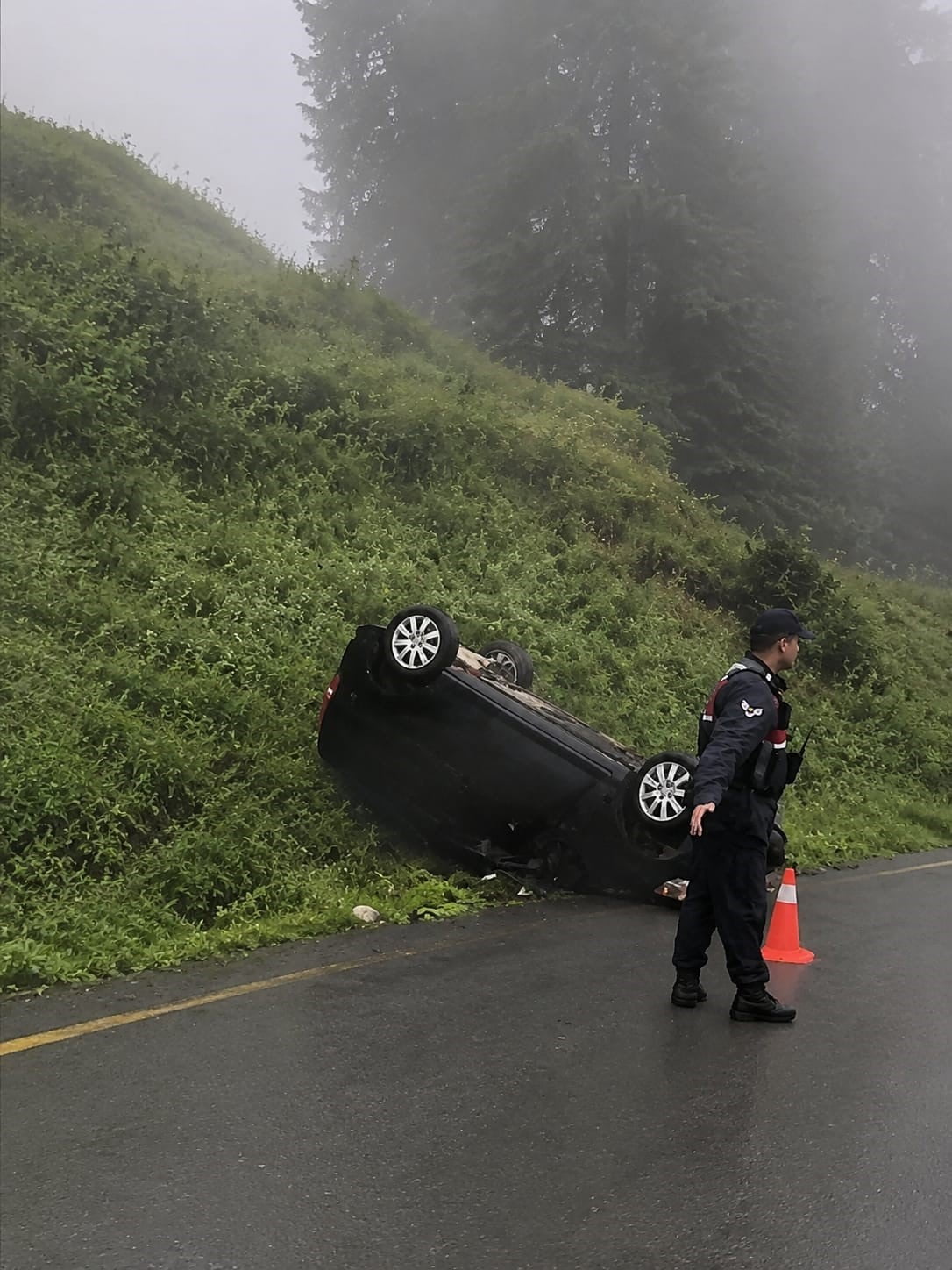 TRABZON'UN AKÇAABAT İLÇESİNDE KONTROLDEN ÇIKAN OTOMOBİLİN UÇURUMA YUVARLANMASI SONUCU MEYDANA...
