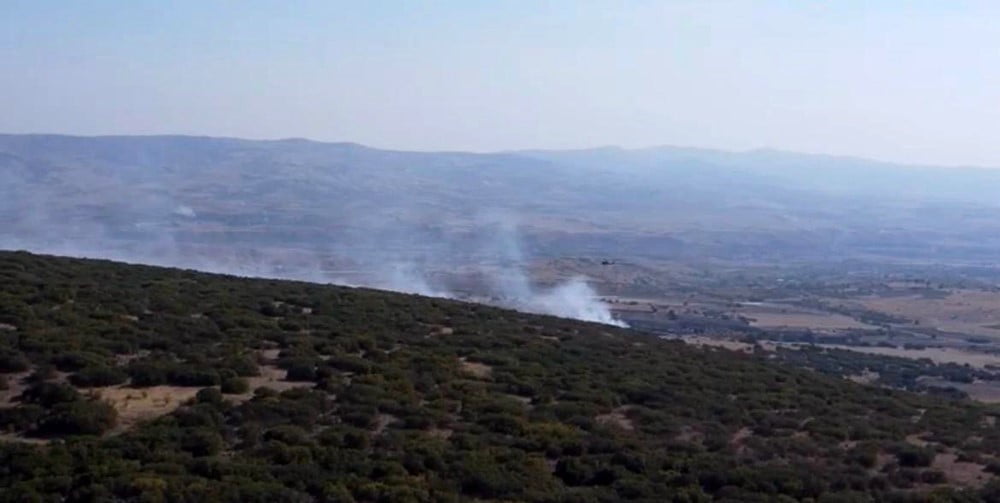 ORMANLIK ALANDA ÇIKAN YANGIN, EKİPLERİN MÜDAHALESİ SONUCU KONTROL ALTINA ALINDI.
